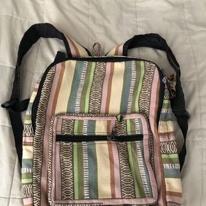 Multi-colored, Rasta style, 100% cotton backpack.